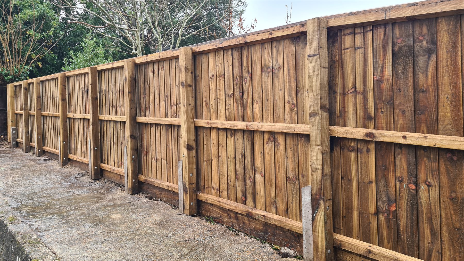 Timber pergola and garden fencing under construction